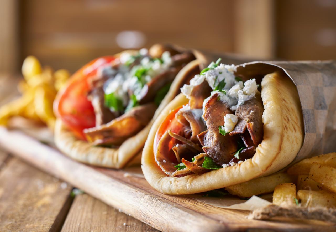 two tasty wrapped greek lamb gyros